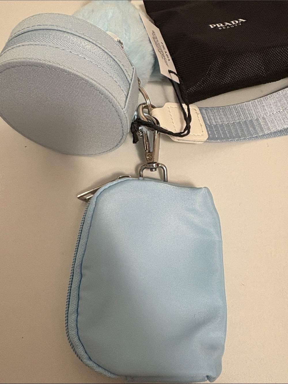 Prada Beauty Round Case with blue wristlet pouch and keychain - Picture 7 of 11